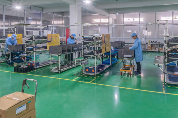麻豆视频免费观看剪式手动平台车在车间搬运工作
